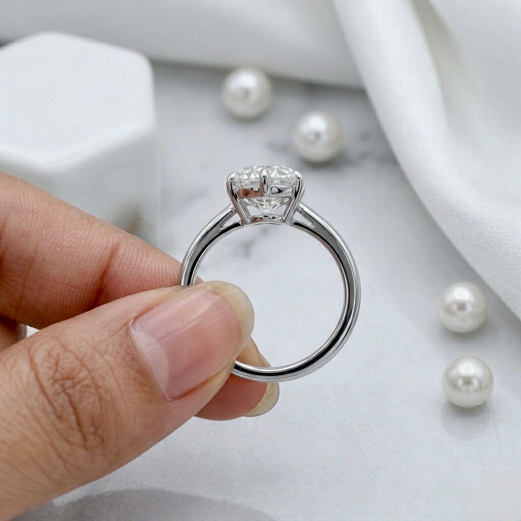 Lumina Pear Cut Solitaire Ring