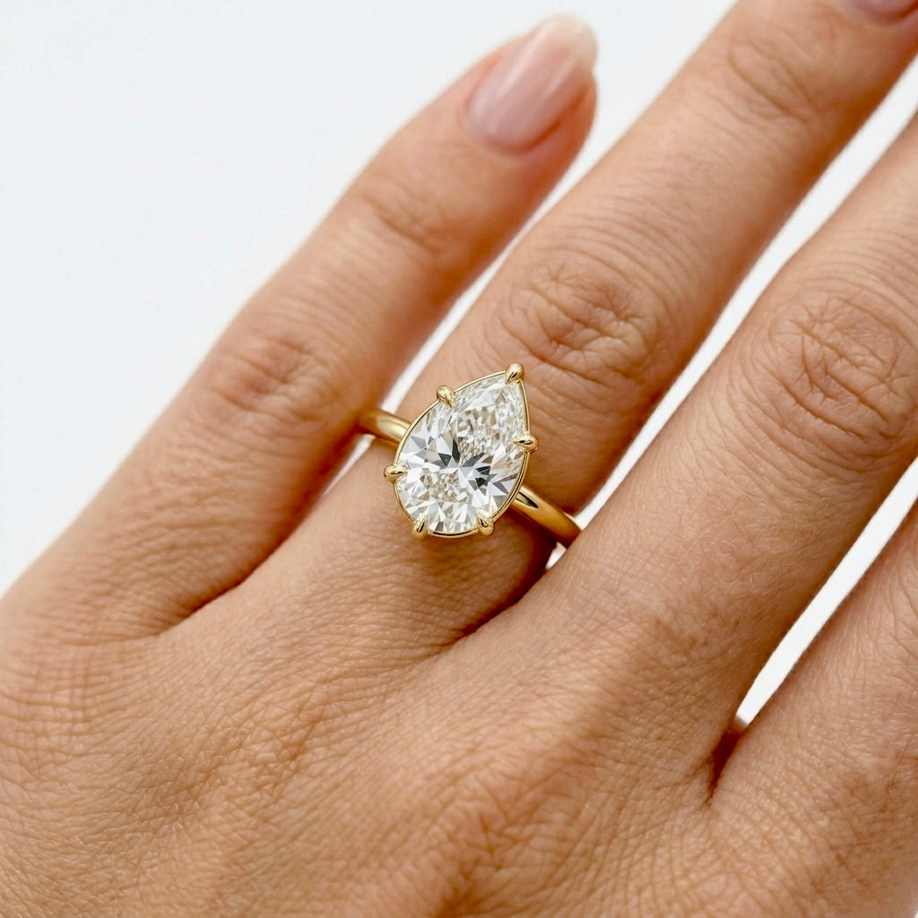 Lumina Pear Cut Solitaire Ring